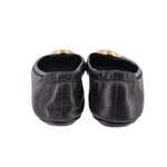 Black leather ballet flats, back view with gathered heel and slip-on opening
