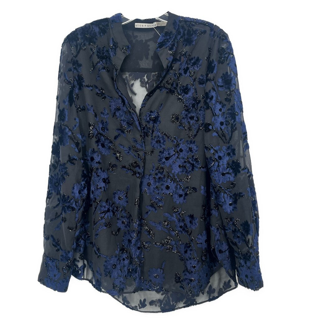 Velvet print blouse with blue floral pattern and button-front V-neck, long sleeves