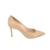 Nude patent leather stiletto heel pump with pointed toe, side view