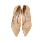 Nude patent leather pointed-toe pumps, front view of both shoes