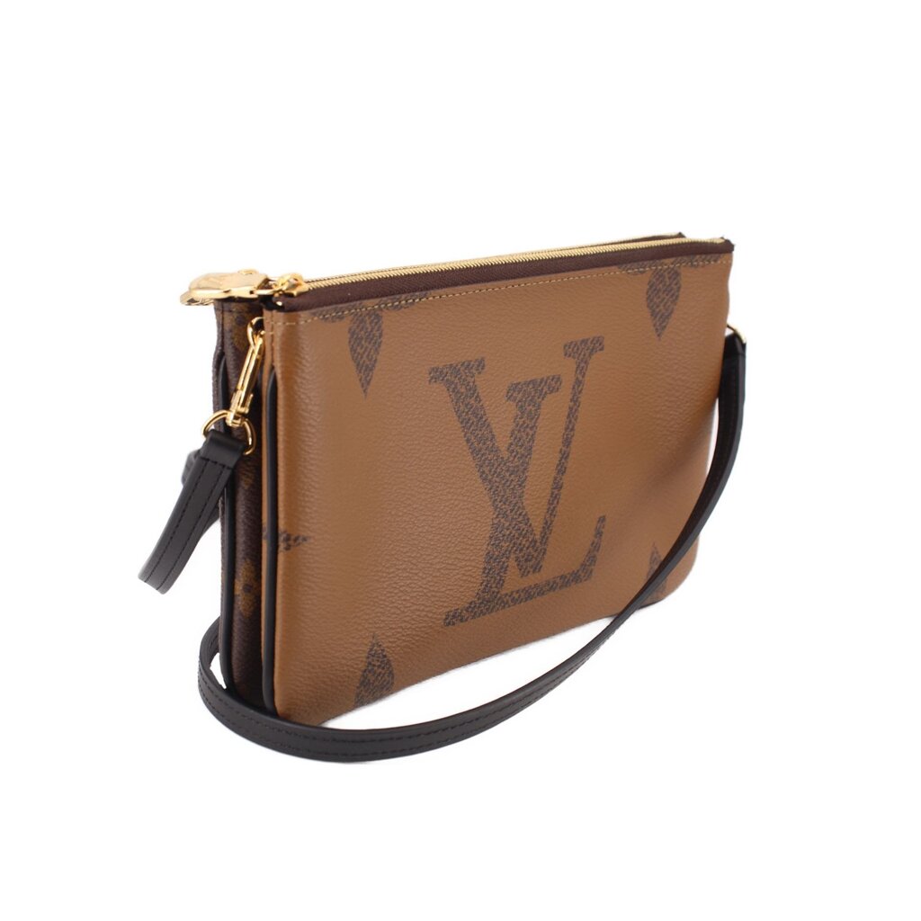 Brown monogram crossbody pochette with gold zipper and black shoulder strap