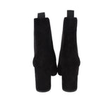 Black suede ankle booties with wide block heel and back pull tabs