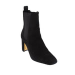 Black suede ankle booties with elastic side panels and block heel