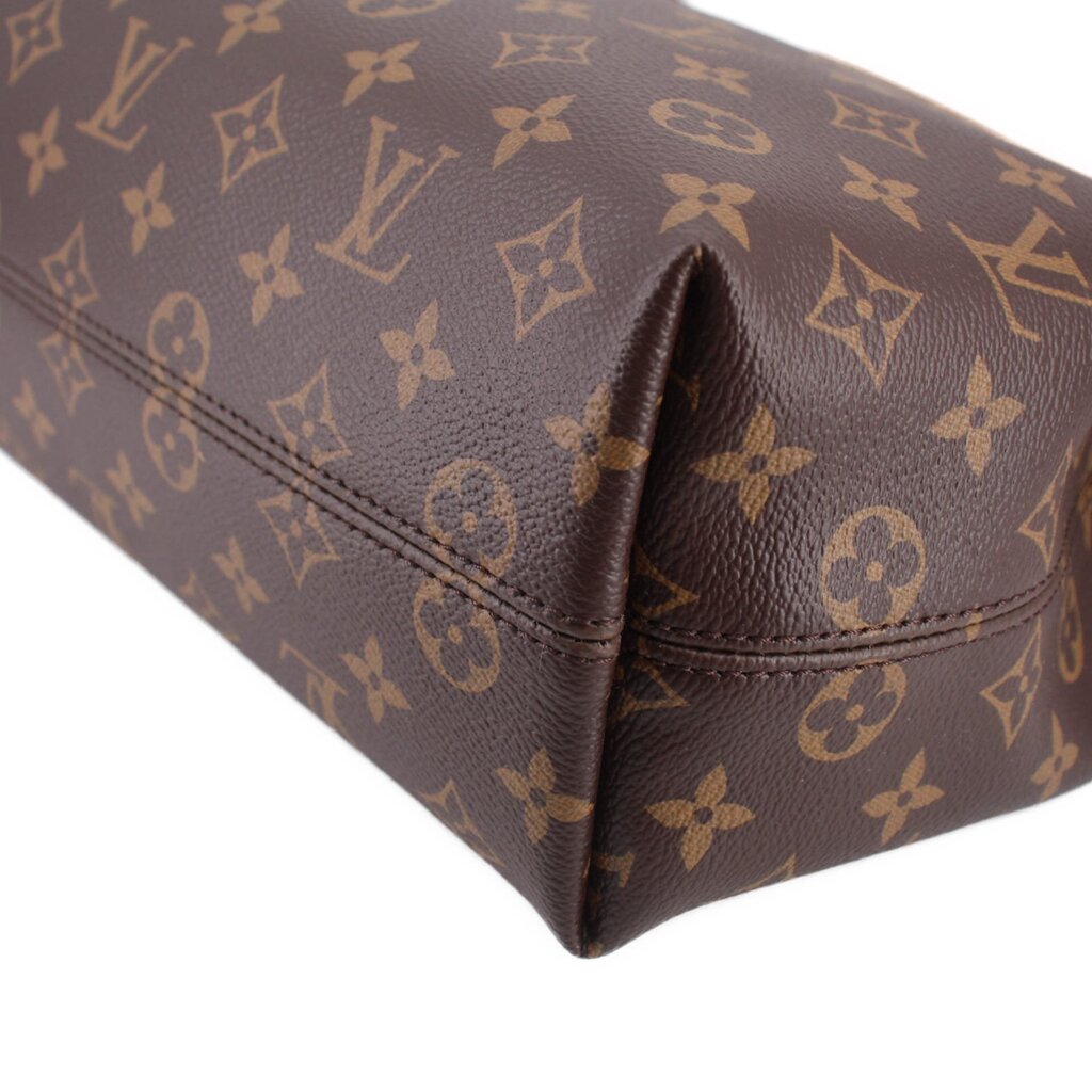 Louis Vuitton monogram corner detail, brown canvas with tan stitching and reinforced edge