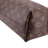 Louis Vuitton monogram corner detail, brown canvas with tan stitching and reinforced edge