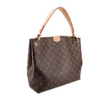 Louis Vuitton monogram shoulder bag, brown canvas with tan handles and gold-tone hardware