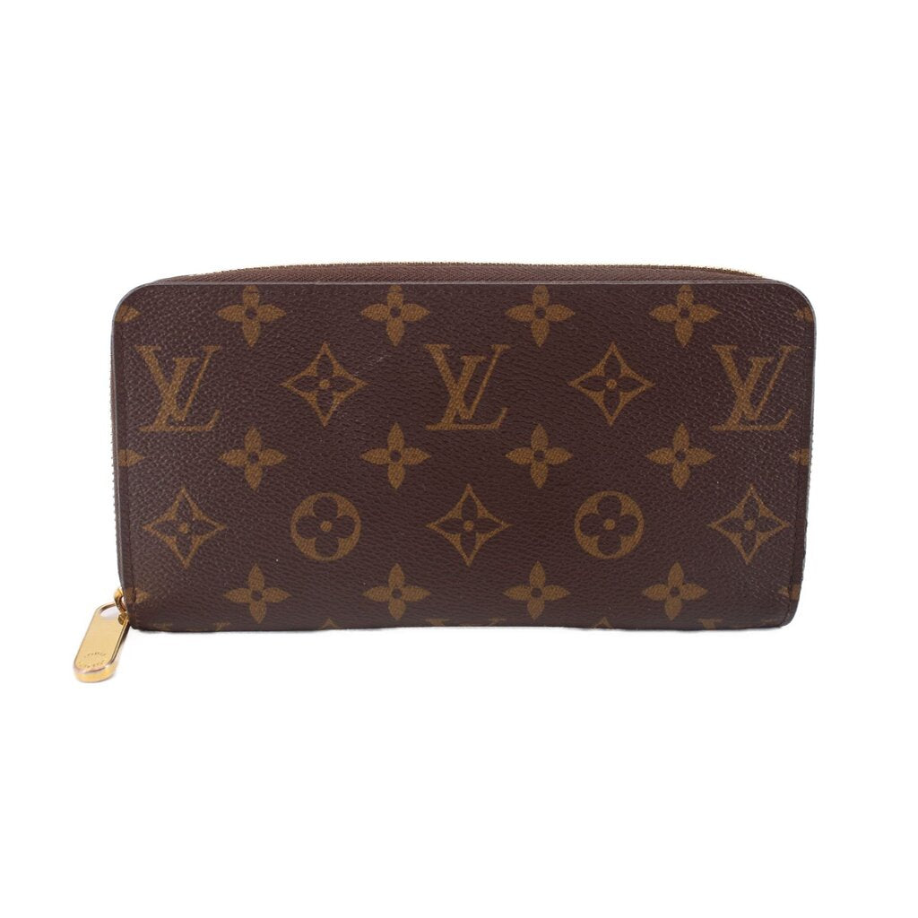 Monogram zip-around wallet with brown patterned canvas and gold zipper hardware