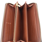 Open zippy wallet interior with brown lining and multiple card slots, zip edges