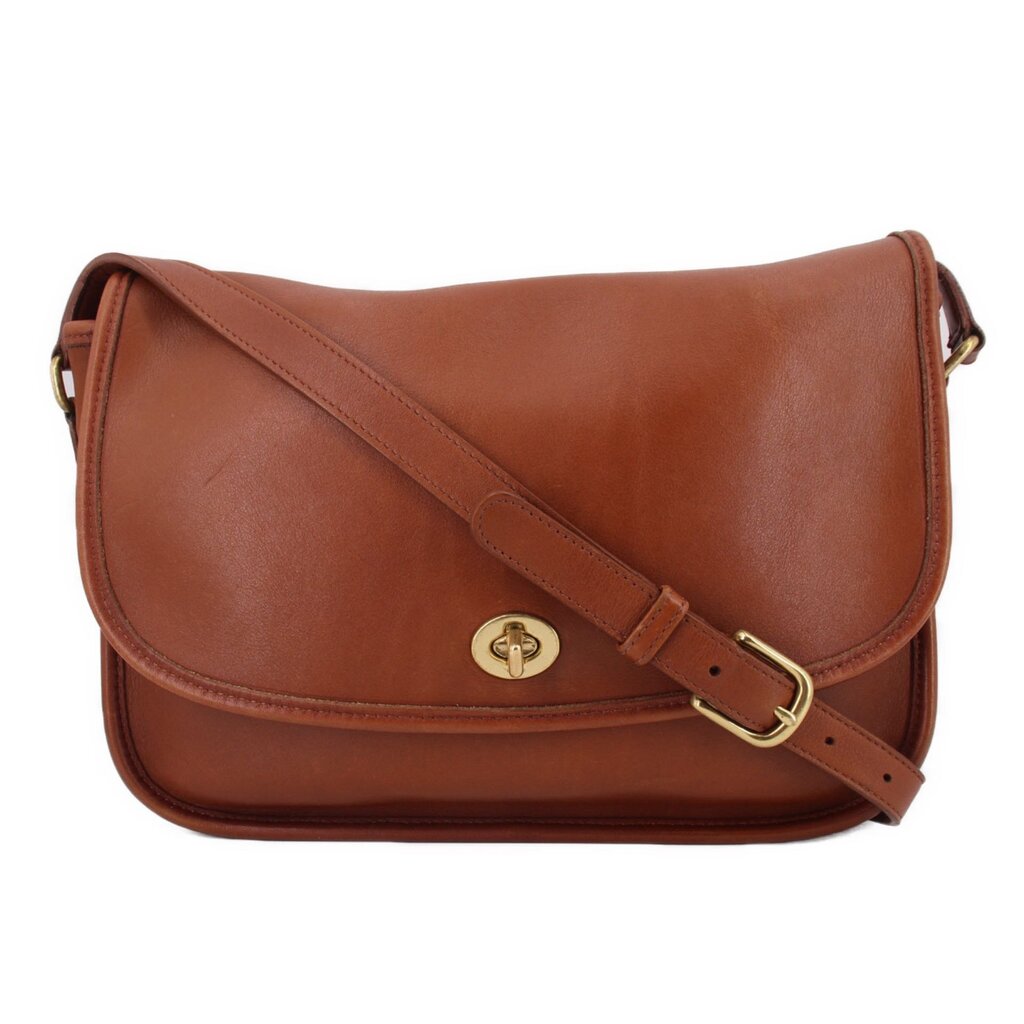 COACH crossbody bag in British tan leather with front flap and turn-lock clasp