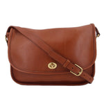 COACH crossbody bag in British tan leather with front flap and turn-lock clasp