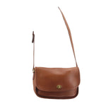 COACH small crossbody bag in British tan leather with long shoulder strap and flap