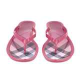 Pink rubber thong sandals, T-strap with gray and white check-pattern footbed