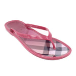 Pink rubber thong sandals with T-strap and check-pattern footbed lining