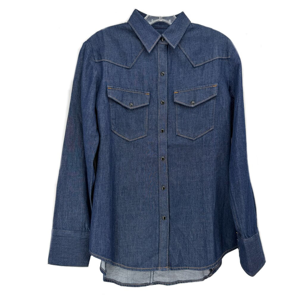 Blue denim button-up shirt with pointed collar, chest pockets, and button front
