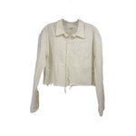 White cropped denim button-up top with point collar and chest pocket, long sleeves