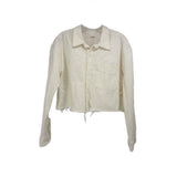 White cropped denim button-up top with point collar and chest pocket, long sleeves