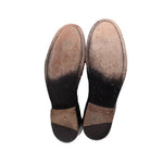 FRYE boot insoles and rubber outsoles, visible tread and arch