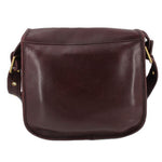 Oxblood leather COACH shoulder bag, back view with curved flap and clean stitching