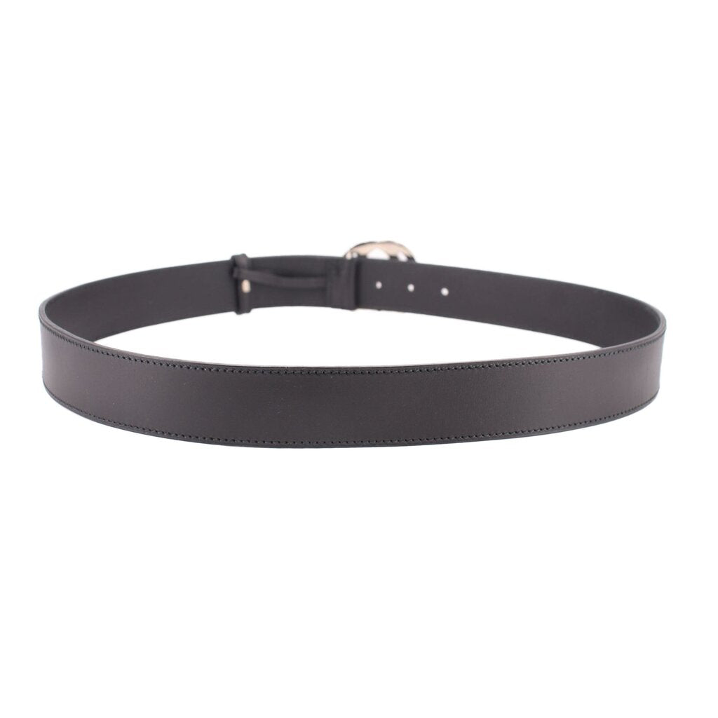 Black leather belt with adjustable holes and prong buckle setting