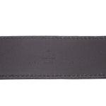 Black leather belt strap with stitched edge and embossed maker stamp