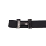 Black leather belt with silver and dark buckle, stitched strap end.