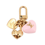 LOUIS VUITTON heart micro charm with gold padlock, engraved hearts, and pink enamel heart