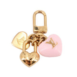 LOUIS VUITTON heart micro charm with gold padlock, engraved hearts, and pink enamel heart