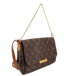 Louis Vuitton Favorite MM crossbody bag with monogram canvas, side view, leather strap
