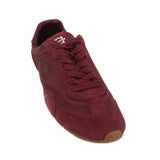 Merlot suede lace-up flat sneakers with side logo and contrast stitching