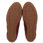Merlot flat sneaker outsoles with textured tread and embossed markings