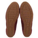Merlot flat sneaker outsoles with textured tread and embossed markings