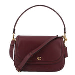 Merlot leather crossbody bag with curved flap and turn-lock closure, gold-tone hardware.