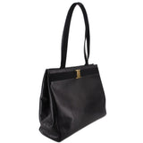 Black leather vintage shoulder bag with structured sides and top handle