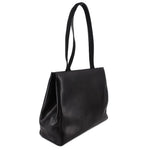 Black leather vintage shoulder bag with angled side profile and top handle