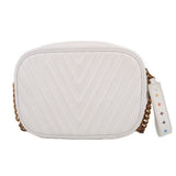 White quilted camera crossbody bag with chevron pattern and gold-tone hardware