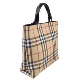 BURBERRY Nova check tote bag side profile with black leather handle and plaid canvas
