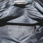 BURBERRY tote bag interior lining with black fabric and repeating logo pattern