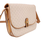 GUCCI vintage crossbody bag with tan shoulder strap and logo-patterned front flap