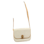 GUCCI vintage crossbody bag on strap with cream logo-patterned flap and tan buckle