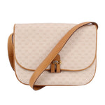GUCCI vintage crossbody bag in cream canvas with tan trim and flap closure