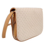 GUCCI vintage crossbody bag side profile with tan strap and curved flap edge