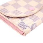 Damier Azur coin purse wallet close-up, check pattern with pink lining and side seam