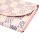 Damier Azur coin purse wallet corner view, check canvas with pink edge and button
