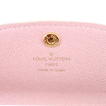 Pink interior coin purse lining with gold button and LOUIS VUITTON PARIS stamp