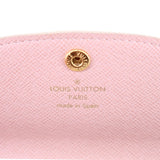 Pink interior coin purse lining with gold button and LOUIS VUITTON PARIS stamp