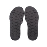 Black rubber outsole for slide sandals with textured tread pattern