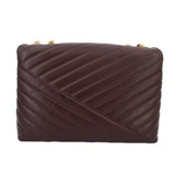 Brown quilted leather convertible shoulder bag with gold chain strap, front view