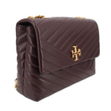 Brown quilted leather shoulder bag with gold chain strap and T logo front clasp