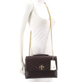 Brown quilted leather mini crossbody bag with gold chain strap and T logo clasp
