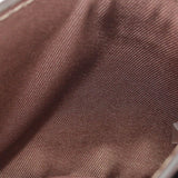 Brown leather texture close-up with fine grain and stitching